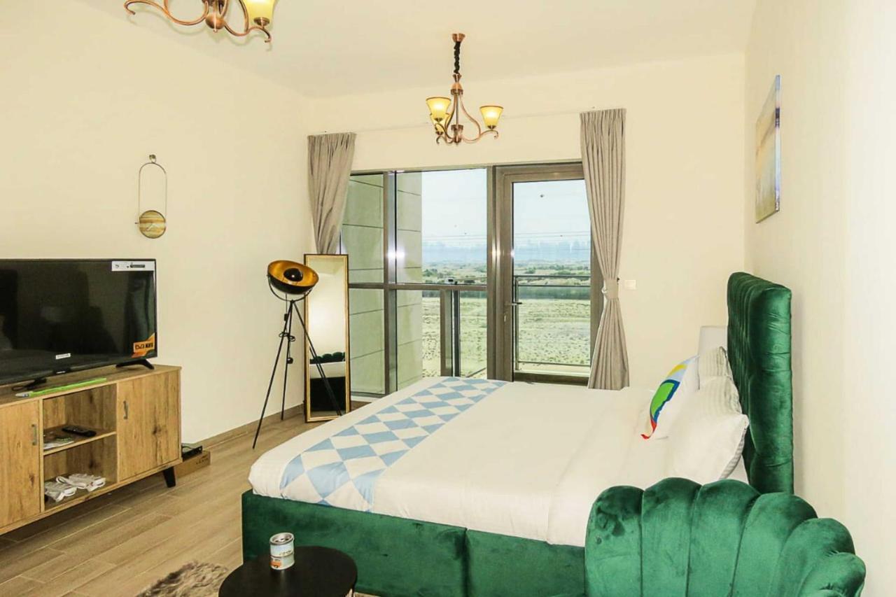 Oyo 860 Studio Apartment, Maya Tower 4, Jumeirah Village Triangle Dubaï Extérieur photo