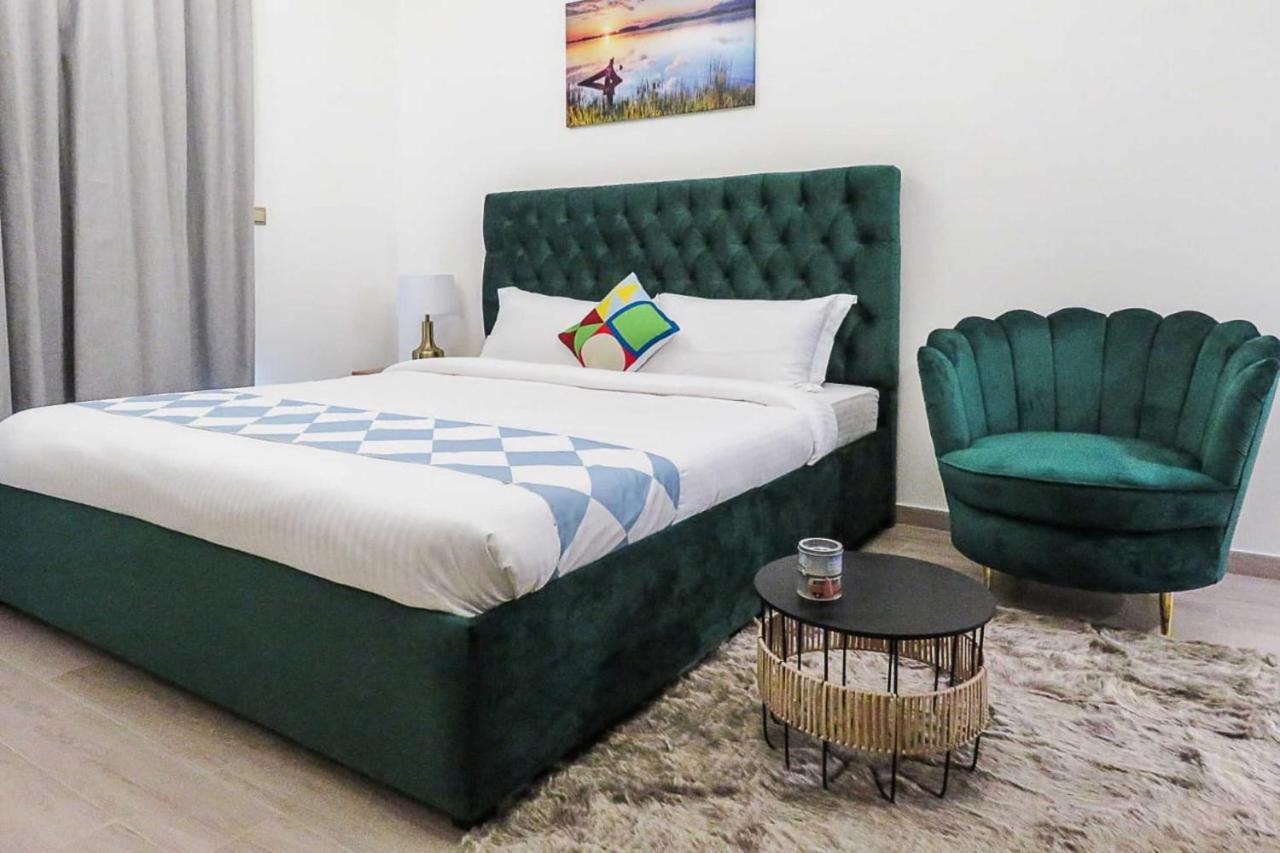 Oyo 860 Studio Apartment, Maya Tower 4, Jumeirah Village Triangle Dubaï Extérieur photo