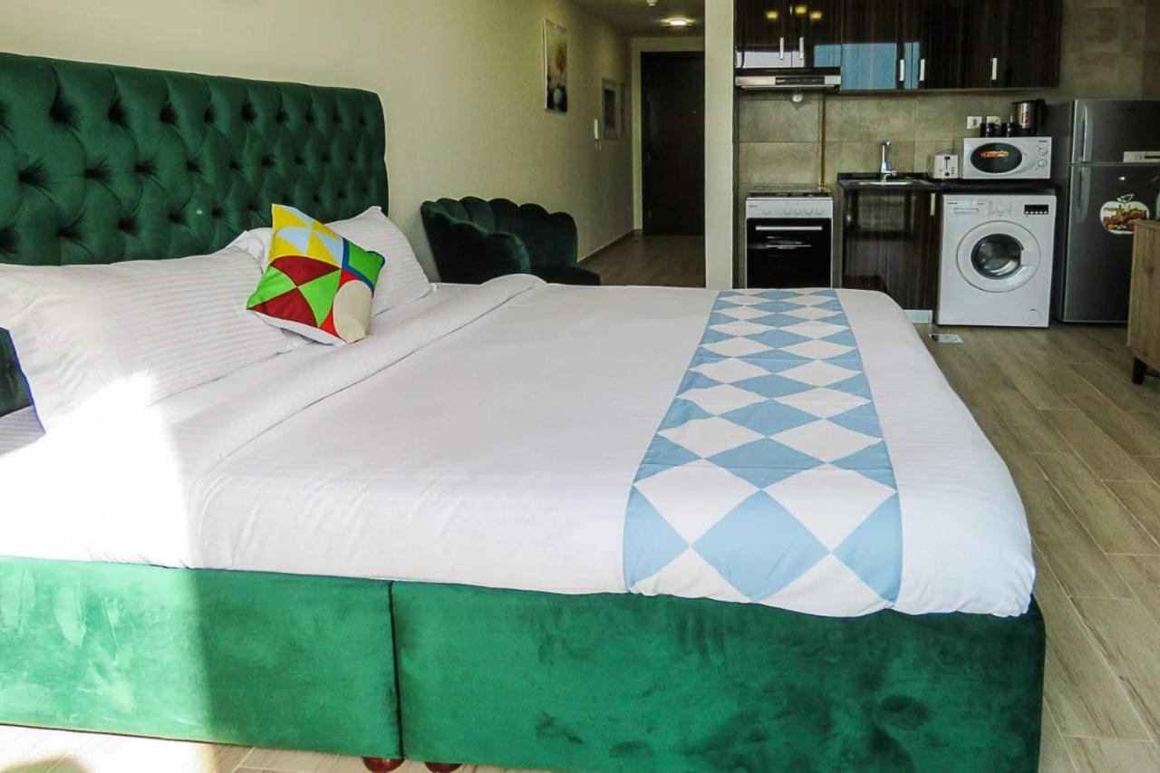 Oyo 860 Studio Apartment, Maya Tower 4, Jumeirah Village Triangle Dubaï Extérieur photo