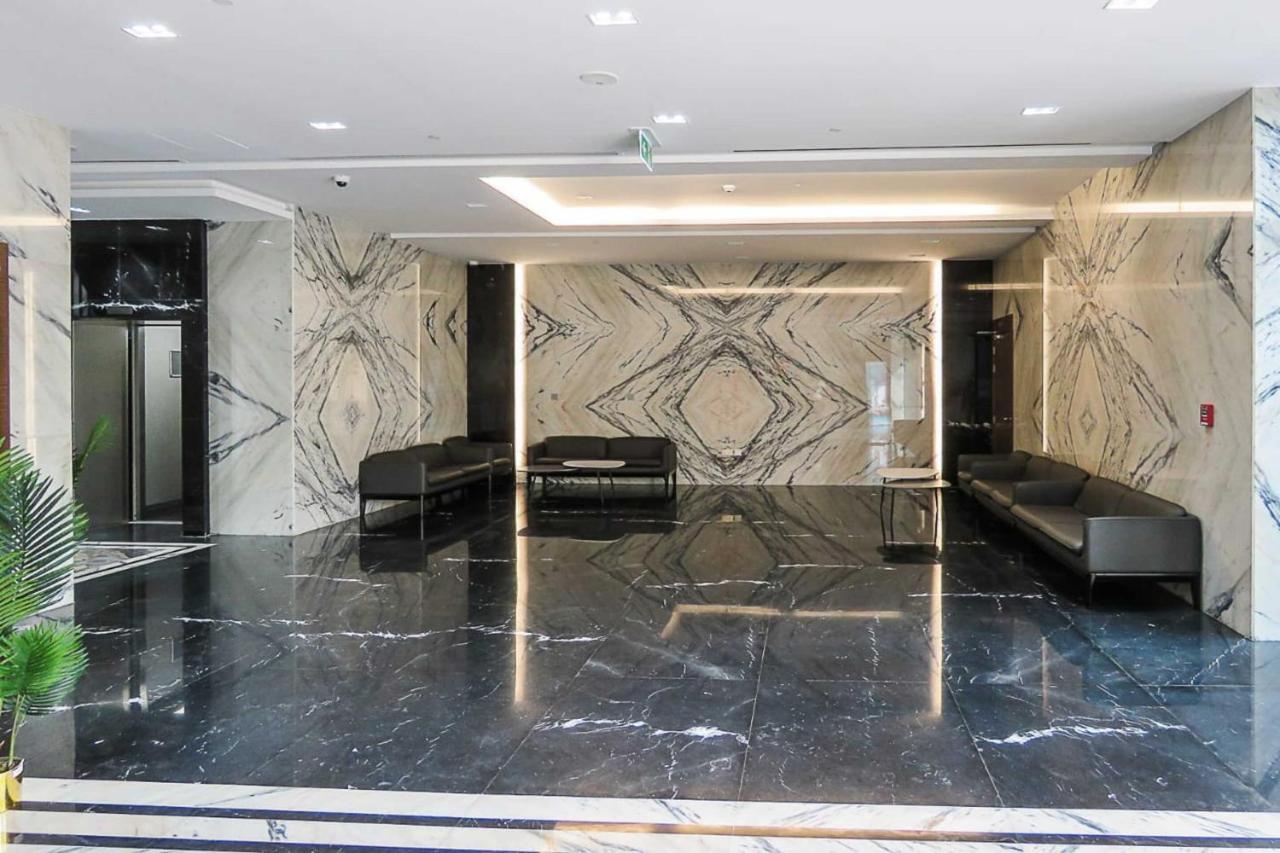 Oyo 860 Studio Apartment, Maya Tower 4, Jumeirah Village Triangle Dubaï Extérieur photo
