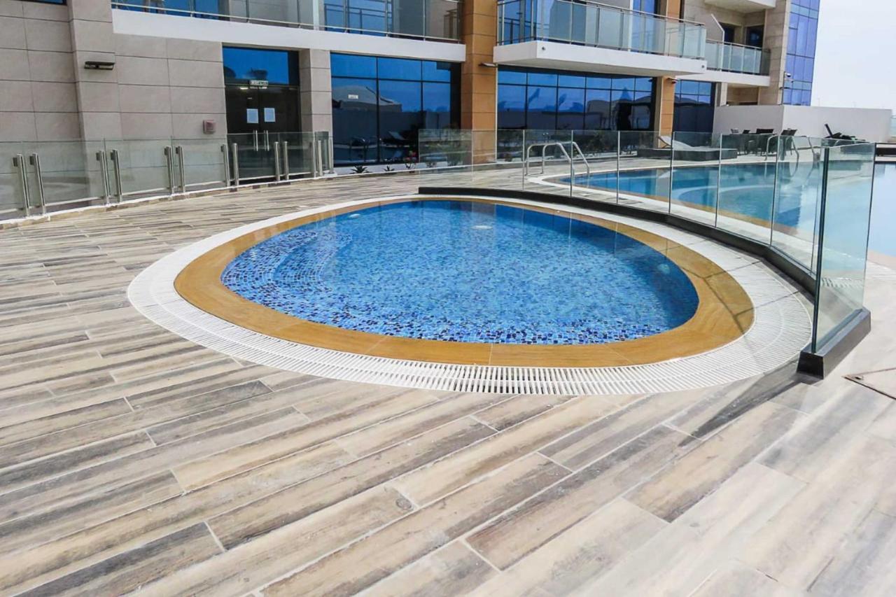 Oyo 860 Studio Apartment, Maya Tower 4, Jumeirah Village Triangle Dubaï Extérieur photo