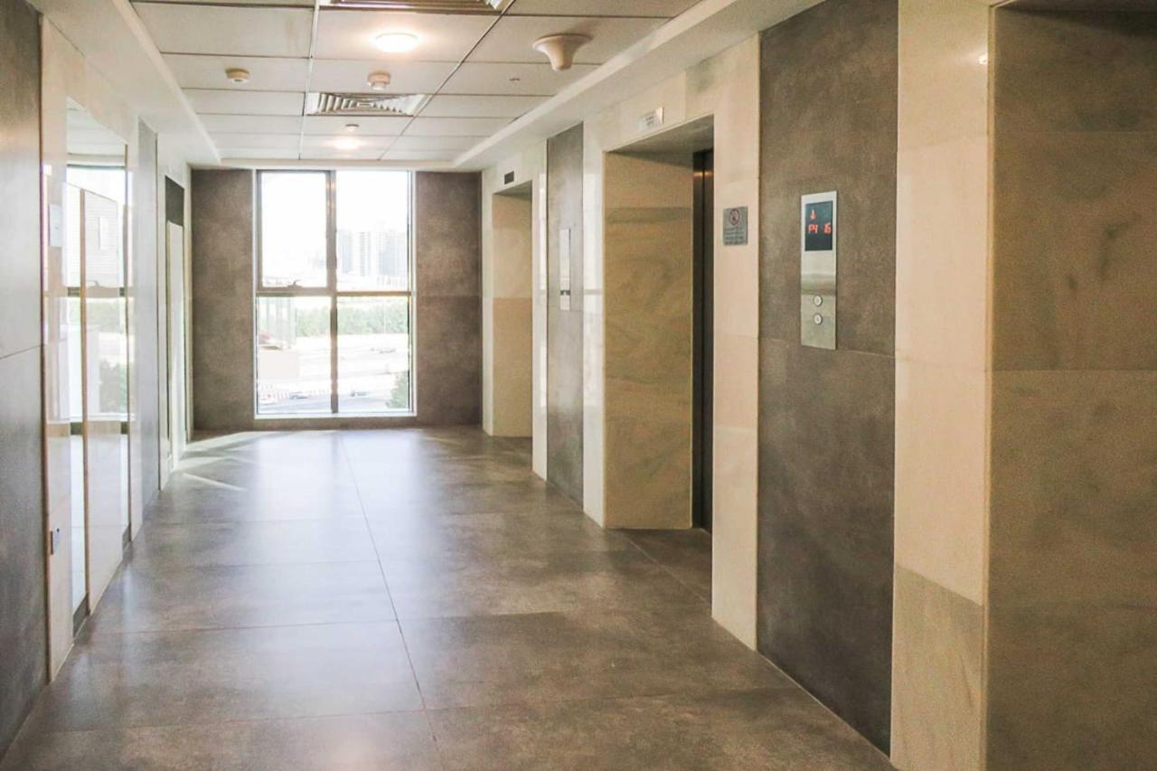 Oyo 860 Studio Apartment, Maya Tower 4, Jumeirah Village Triangle Dubaï Extérieur photo